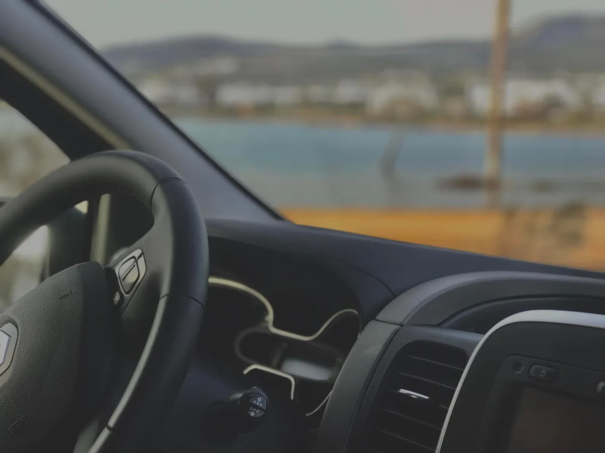 The sea, seen from the driver's seat of our van.